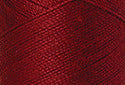 A swatch of Mettler Silk Finish 50 Thread Fire Engine 0105