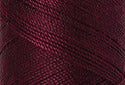A swatch of Mettler Silk Finish 50 Thread Bordeaux 0109