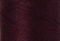 A swatch of Mettler Silk Finish 50 Thread Beet Red 0111
