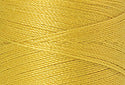 A swatch of Mettler Silk Finish 50 Thread Lemon Peel 0115