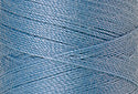 A swatch of Mettler Silk Finish 50 Thread Azure Blue 0272