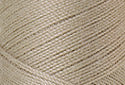 A swatch of Mettler Silk Finish 50 Thread Tantone 0372