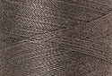 A swatch of Mettler Silk Finish 50 Thread Old Tin 0415