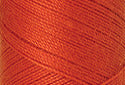 A swatch of Mettler Silk Finish 50 Thread Paprika 0450