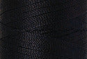 A swatch of Mettler Silk Finish 50 Thread Darkest Blue 0821