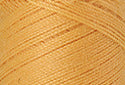 A swatch of Mettler Silk Finish 50 Thread Candlelight 0891