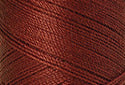 A swatch of Mettler Silk Finish 50 Thread Brick 1074