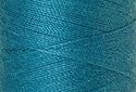 A swatch of Mettler Silk Finish 50 Thread Caribbean Blue 1394
