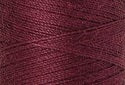 A swatch of Mettler Silk Finish 50 Thread Claret 1461