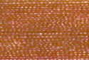 A swatch of Mettler Silk Finish 50 Thread Amber Brown 2103