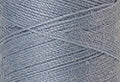 A swatch of Mettler Silk Finish 50 Thread Ash Blue 0042