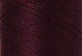 A swatch of Mettler Silk Finish 50 Thread Beet Red 0111