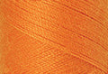 A swatch of Mettler Silk Finish 50 Thread Pumpkin 0122
