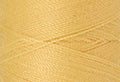 A swatch of Mettler Silk Finish 50 Thread Parchment 0140