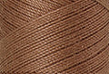 A swatch of Mettler Silk Finish 50 Thread Walnut 0280