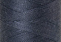 A swatch of Mettler Silk Finish 50 Thread Blue Shadow 0311