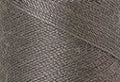 A swatch of Mettler Silk Finish 50 Thread Rain Cloud 0322