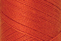 A swatch of Mettler Silk Finish 50 Thread Paprika 0450
