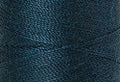 A swatch of Mettler Silk Finish 50 Thread Tartan Blue 0485