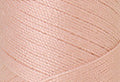 A swatch of Mettler Silk Finish 50 Thread Flesh 0600