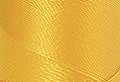 A swatch of Mettler Silk Finish 50 Thread Sunshine 0608