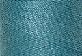 A swatch of Mettler Silk Finish 50 Thread Blue-green Opal 0611