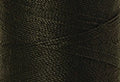 A swatch of Mettler Silk Finish 50 Thread Avocado 0719