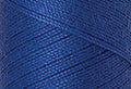 A swatch of Mettler Silk Finish 50 Thread Cobalt Blue 0815