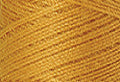 A swatch of Mettler Silk Finish 50 Thread Star Gold 0892