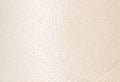 A swatch of Mettler Silk Finish 50 Thread Eggshell 1000