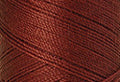 A swatch of Mettler Silk Finish 50 Thread Brick 1074