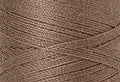 A swatch of Mettler Silk Finish 50 Thread Khaki 1228