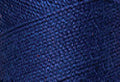 A swatch of Mettler Silk Finish 50 Thread Royal Blue 1303