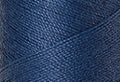 A swatch of Mettler Silk Finish 50 Thread Steel Blue 1316