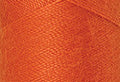 A swatch of Mettler Silk Finish 50 Thread Clay 1334
