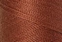 A swatch of Mettler Silk Finish 50 Thread Dirty Penny 1347