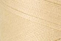 A swatch of Mettler Silk Finish 50 Thread Lime Blossom 1384