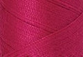 A swatch of Mettler Silk Finish 50 Thread Fuschia 1421