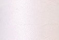 A swatch of Mettler Silk Finish 50 Thread White 2000
