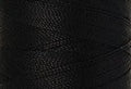 A swatch of Mettler Silk Finish 50 Thread Black 4000